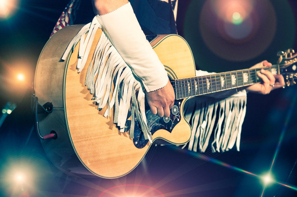 Woman playing guitar in Nashville